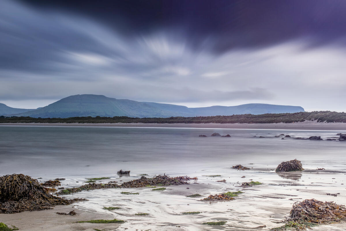 View across Mullaghmore Strand towards Truskmore and Ben Bulben